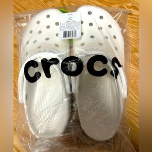 White Clog Style Crocs, 9W, 7M. New/unopened in original packaging.